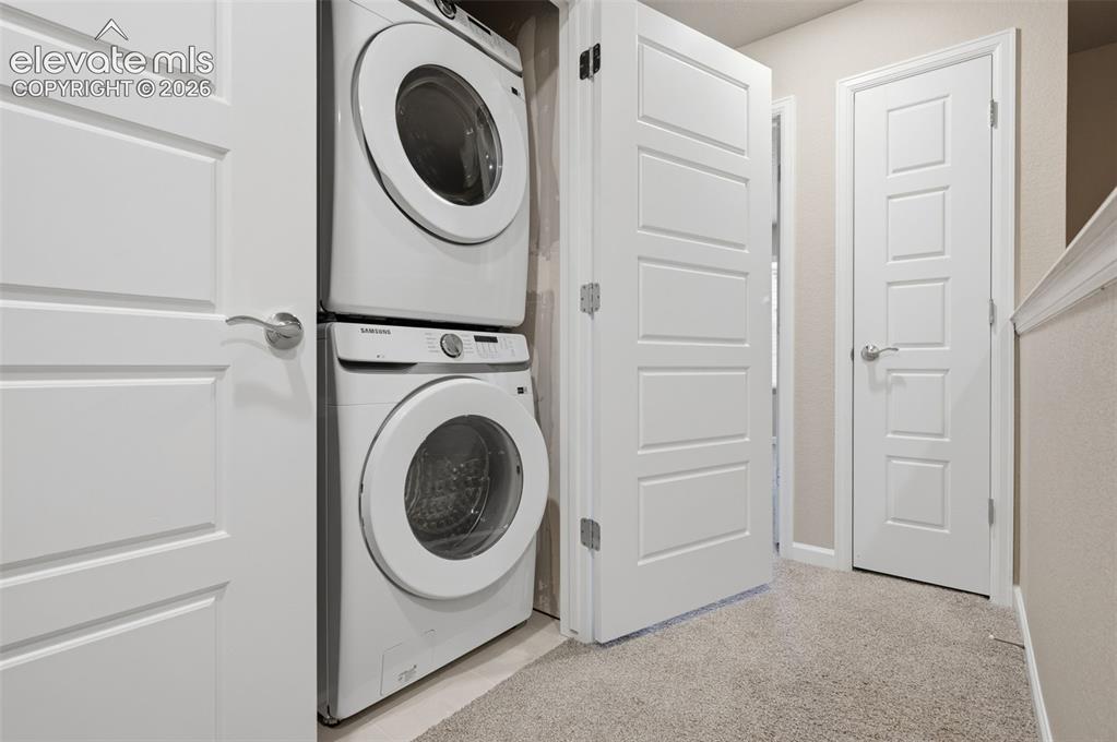 Image 7 of 24: Laundry/utility closet conveniently located on upper level next to bedrooms
