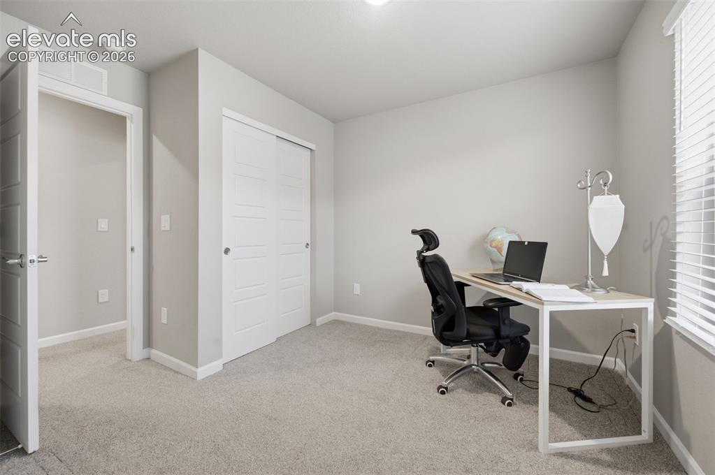 Image 8 of 24: Second bedroom on upper level