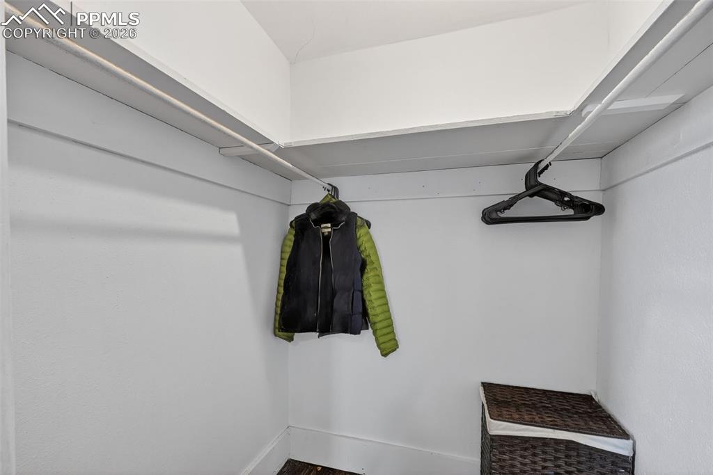 Image 15 of 34: Spacious walk-in closet