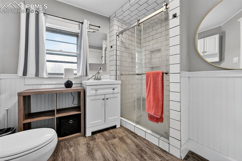 Image 16 of 34: En-suite bathroom featuring a generous walk-in shower