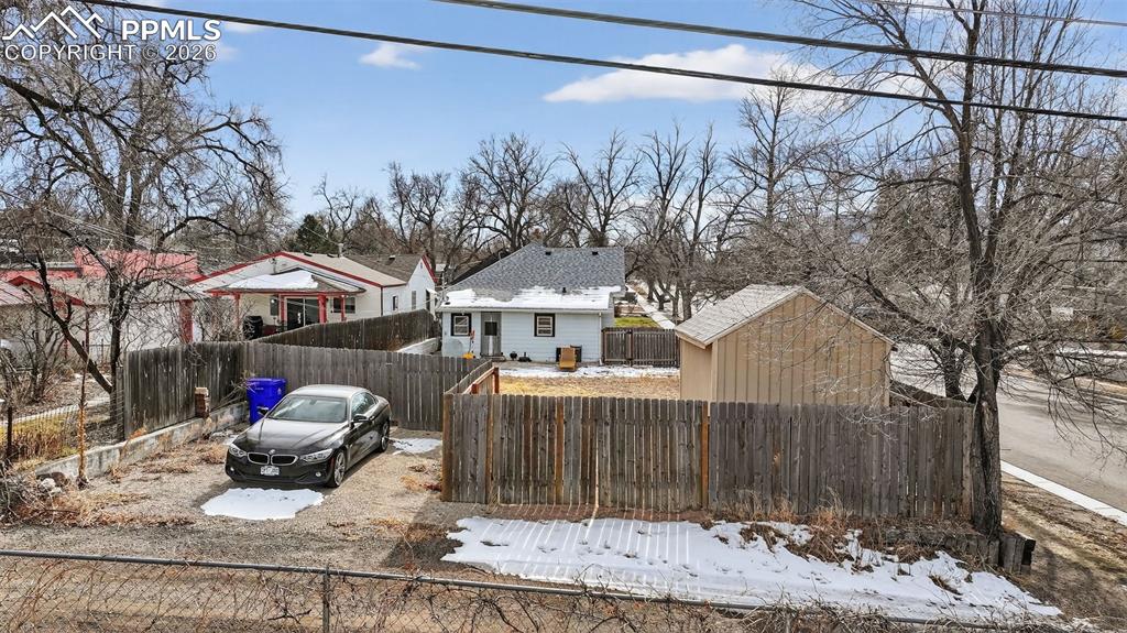 Image 25 of 34: Off street parking, offers space for trailer or camper parking - alley acce