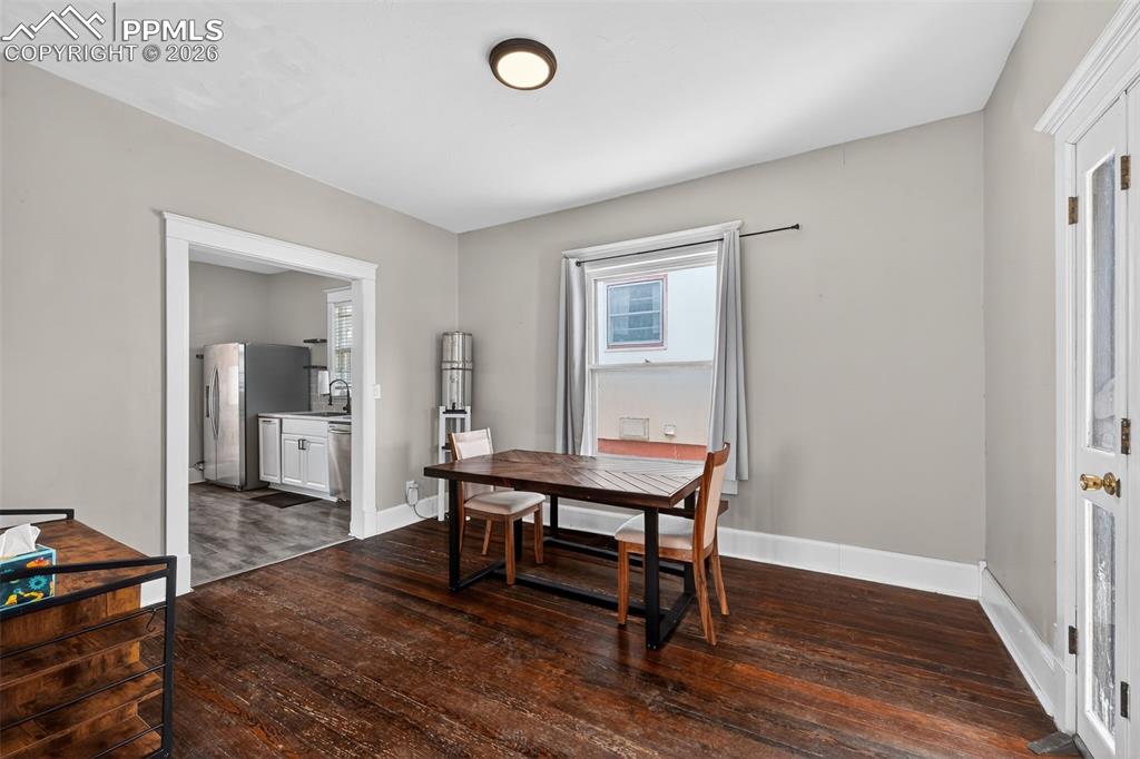 Image 7 of 34: Large dining area opens into updated kitchen
