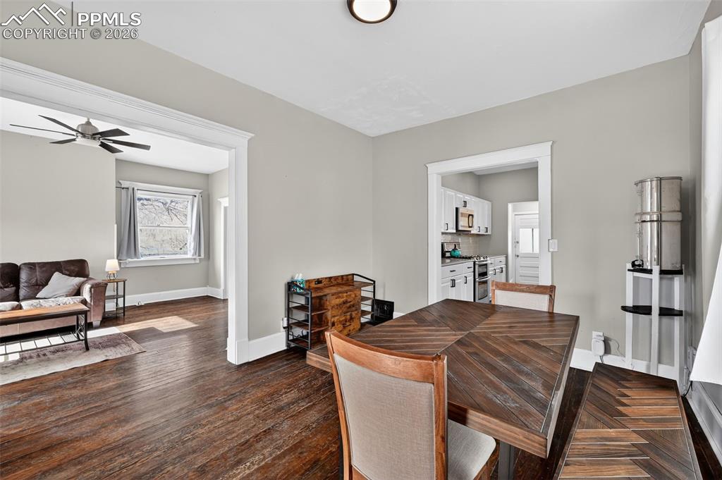 Image 8 of 34: Dining Area flows into either the Living Room or Kitchen - perfect for gues