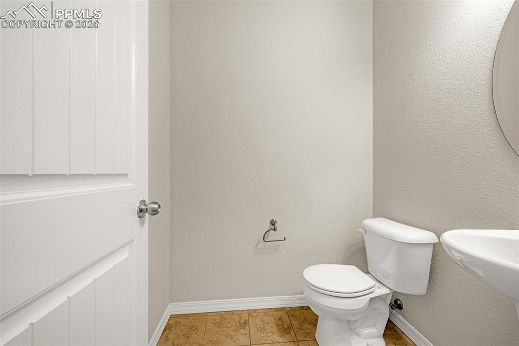 Image 16 of 37: Main level powder bath