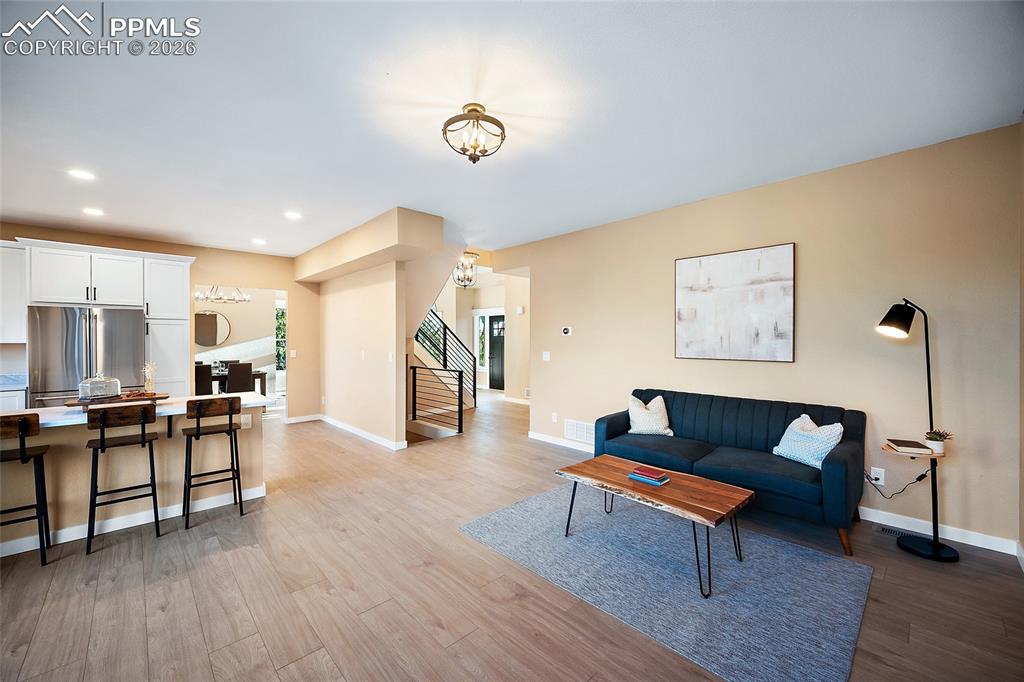 Image 17 of 50: Living area featuring recessed lighting and and LVP flooring