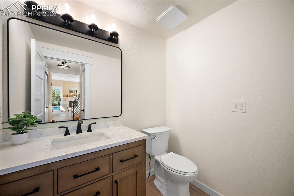 Image 19 of 50: Main floor Bathroom with vanity and motion censored lighting