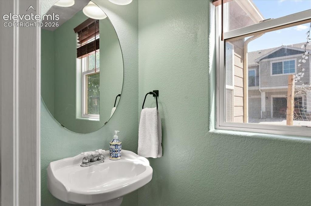 Image 16 of 47: Main Level half bath