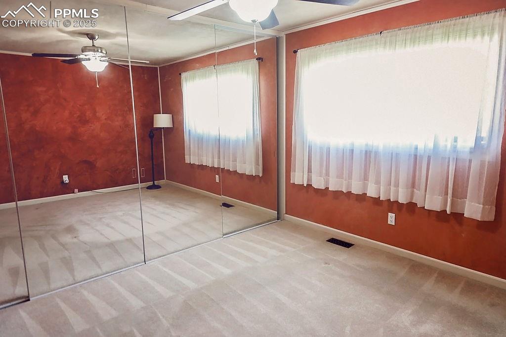 Image 10 of 50: Primary Bedroom w/ 2 Separate Closet Areas