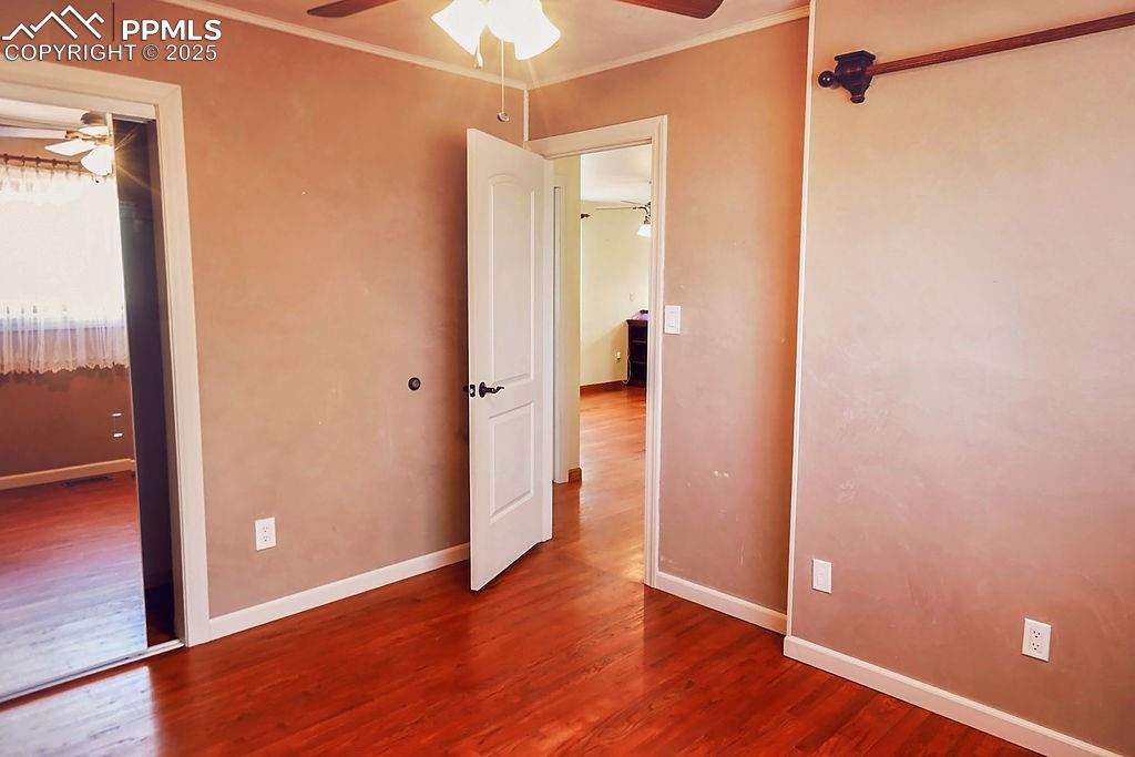 Image 14 of 50: Bedroom #2 w/ Ceiling Fan