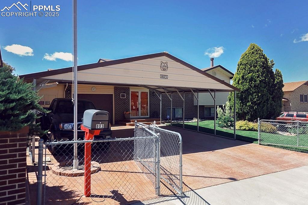 Image 2 of 50: Fully Fenced Front Yard (including Driveway)
