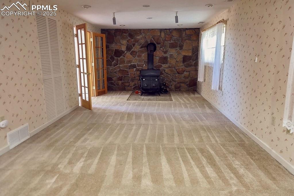 Image 24 of 50: Family Room w/ Fireplace