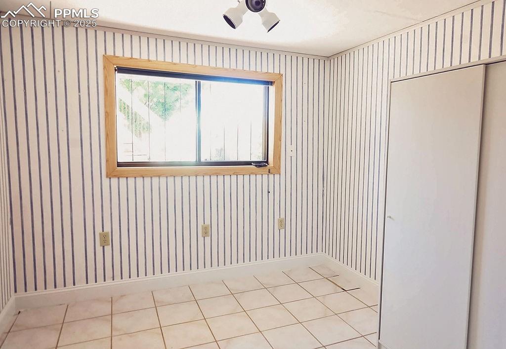 Image 30 of 50: Bedroom #4 w/ French Doors