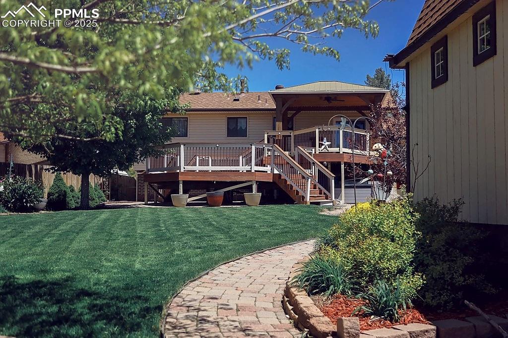 Image 32 of 50: Back Exterior & Yard