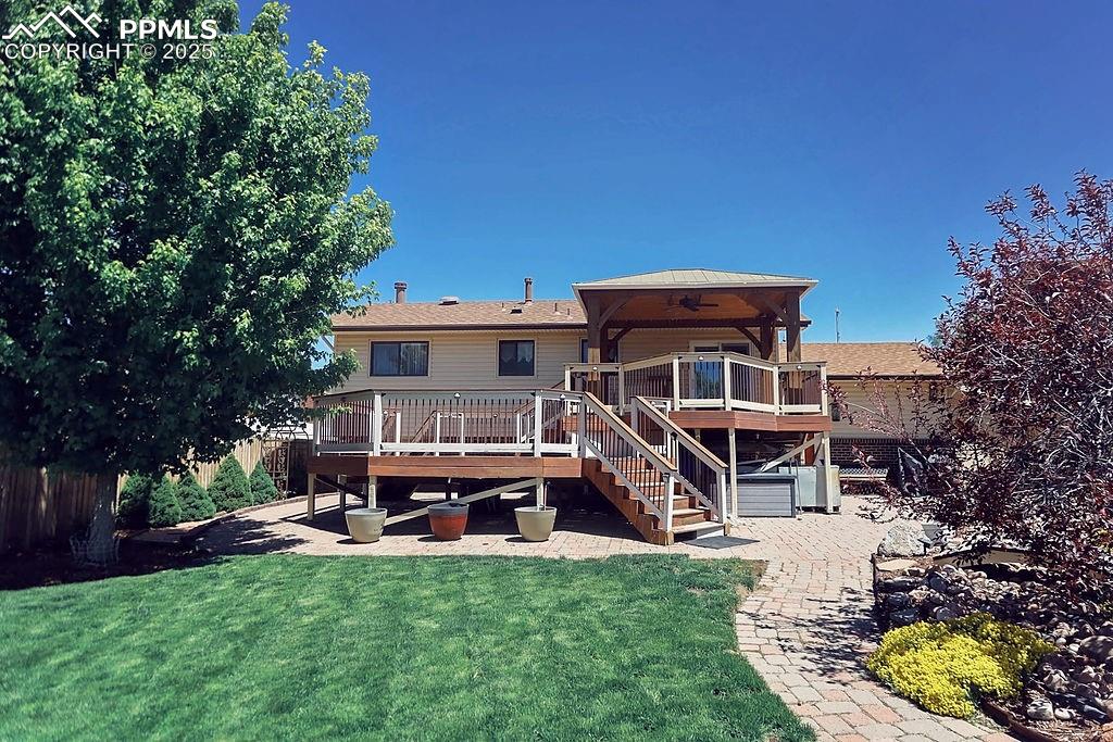 Image 33 of 50: Back Exterior & Yard