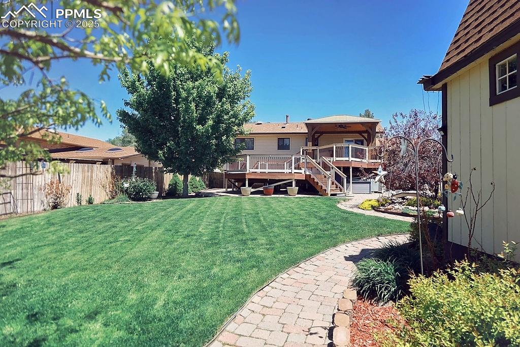 Image 35 of 50: Back Exterior & Yard