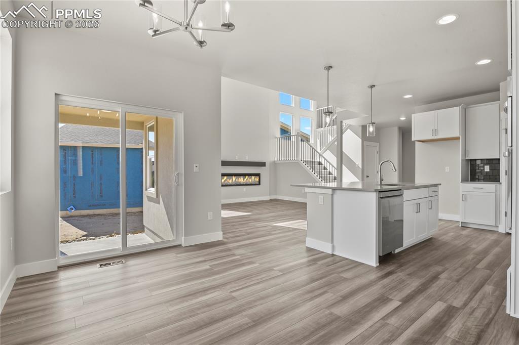 Image 15 of 43: Separate dining area with walk-out access to the backyard