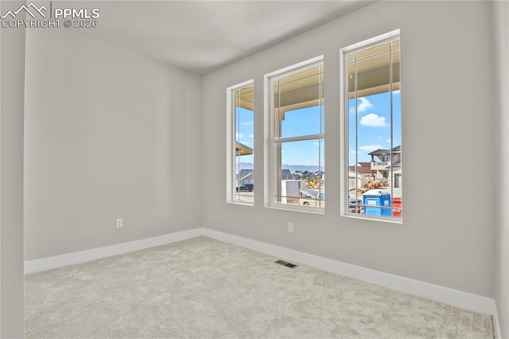 Image 16 of 43: Main level bedroom