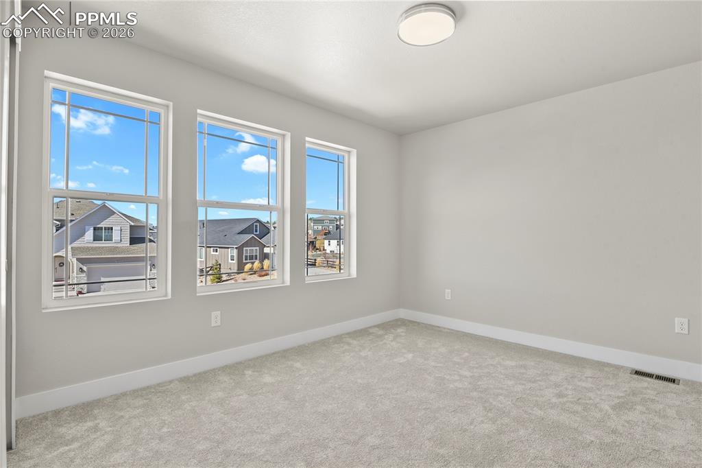 Image 28 of 43: Upper level bedroom