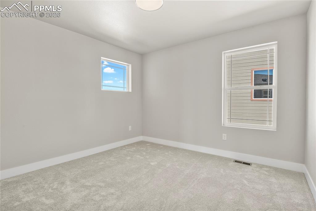 Image 31 of 43: Upper level bedroom