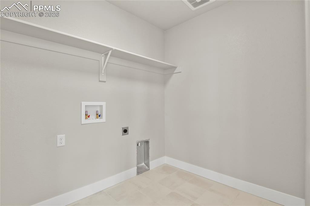 Image 33 of 43: Convenient upper-level laundry