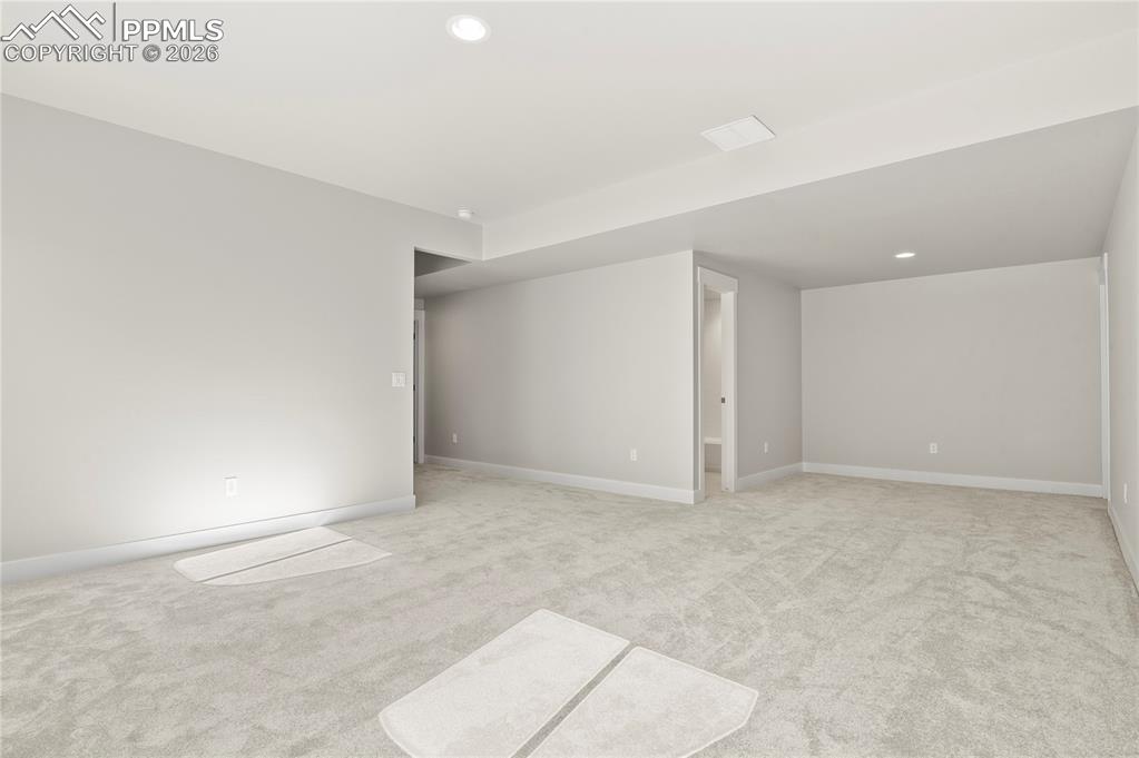 Image 34 of 43: Finished basement expands the home with a large family room