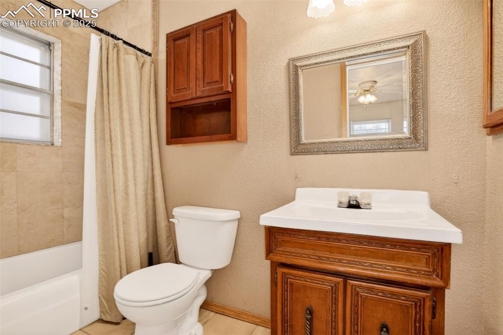 Image 14 of 37: Primary attached bath