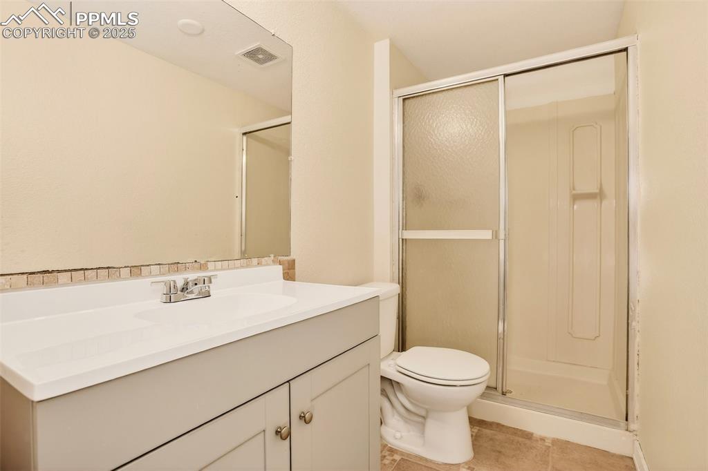 Image 26 of 37: Attached basement bath