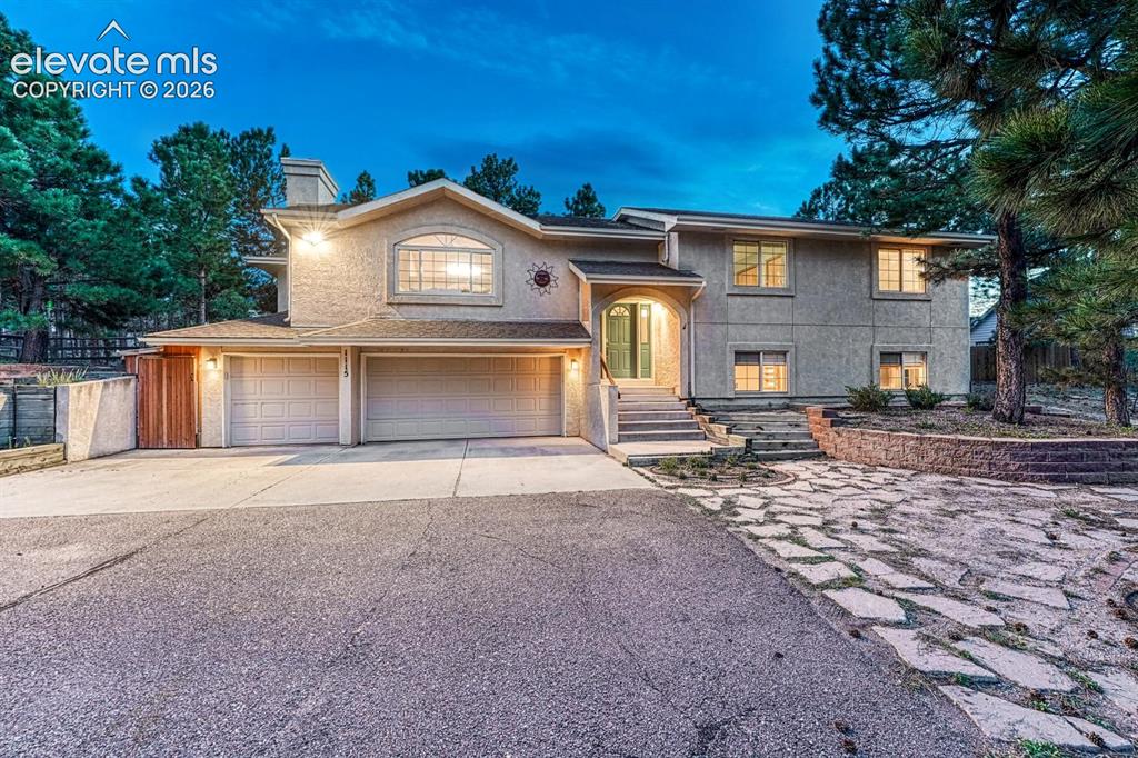 Image 1 of 46: 4 br/3 bath home with 3 car garage and secure attached shed nestled in the