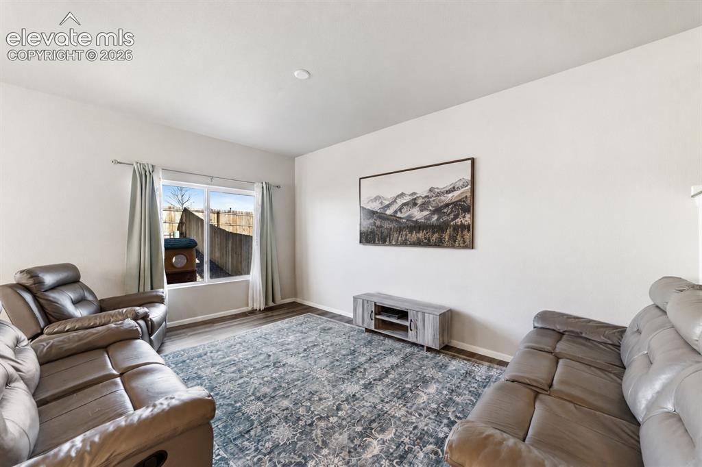 Image 5 of 21: Comfortable gathering space ideal for everyday living and entertaining.