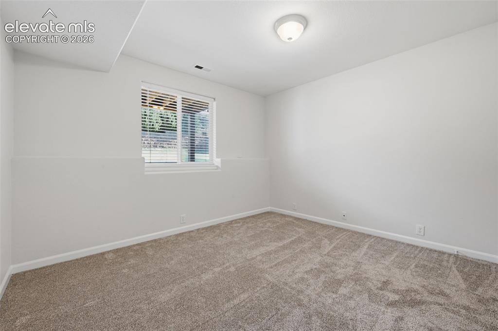 Image 15 of 28: Entry Level Bedroom- 4th