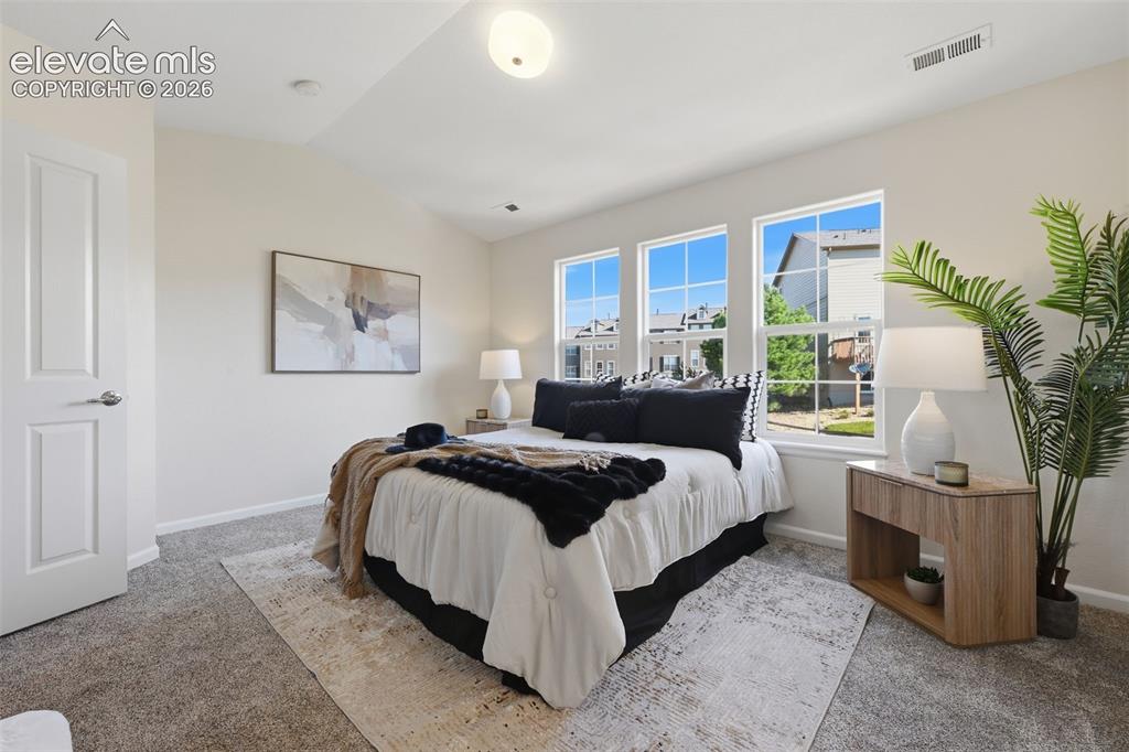 Image 17 of 28: Master bedroom