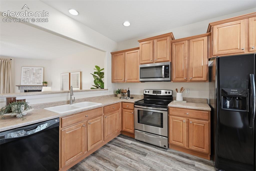 Image 7 of 28: Main level kitchen