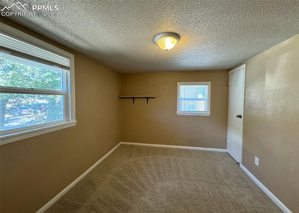 Image 14 of 23: Bedroom