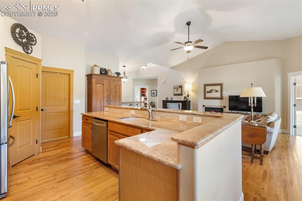 Image 12 of 39: Kitchen and Living Room