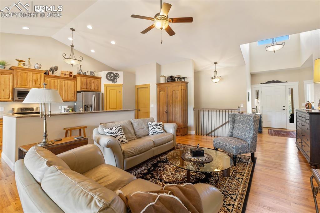 Image 13 of 39: Living Room and gas fireplace