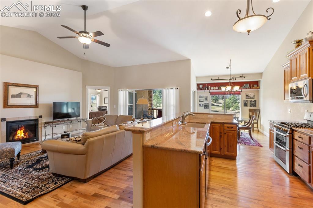 Image 14 of 39: Kitchen, Living and Dining Room