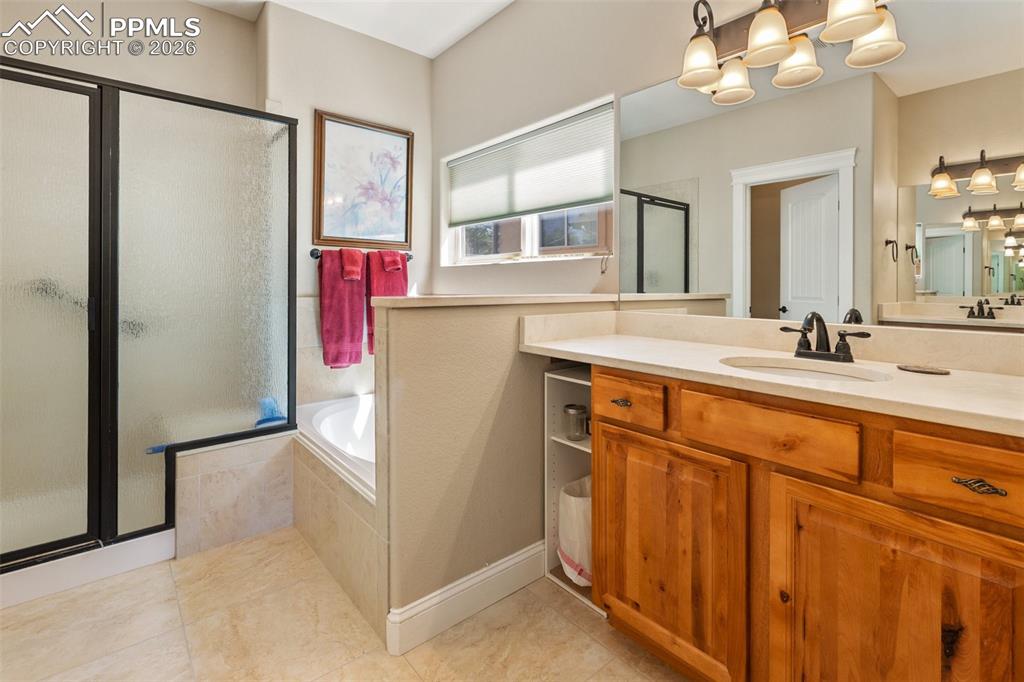 Image 20 of 39: Office with built in book shelves.