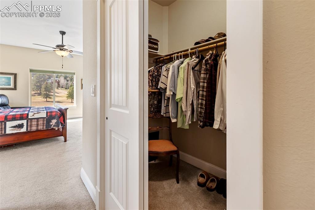 Image 22 of 39: Walk in closet