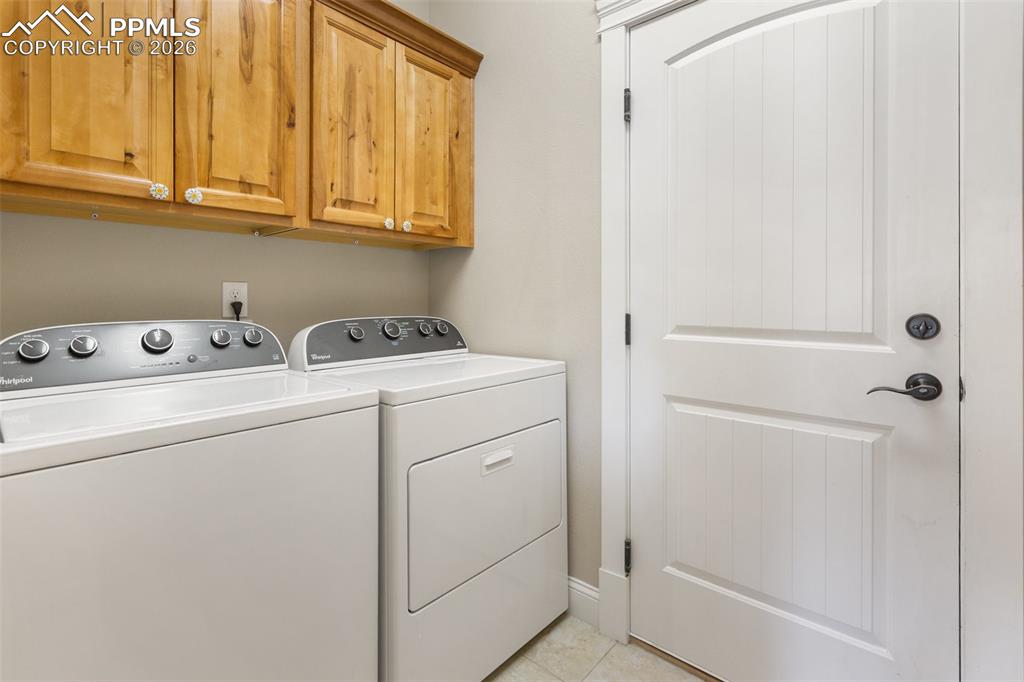 Image 23 of 39: Primary Bedroom with walk out to deck 