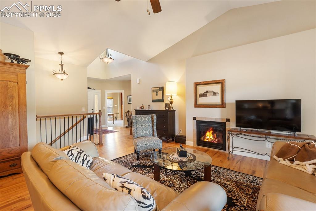 Image 8 of 39: Living Room and gas fireplace
