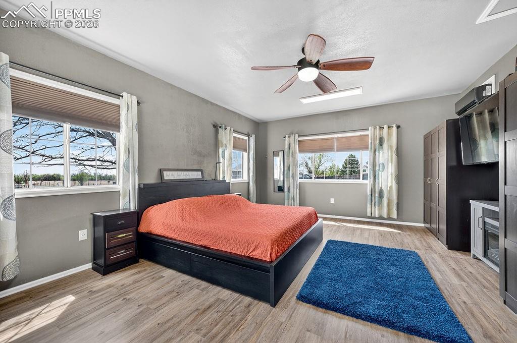 Image 25 of 46: Large primary bedroom on main floor