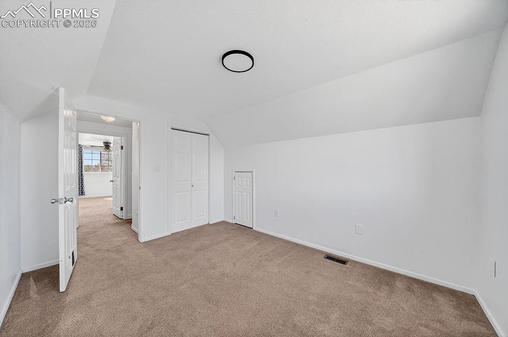 Image 28 of 46: Upstairs bedroom.