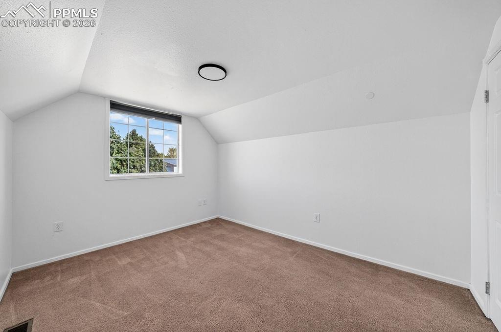 Image 29 of 46: Upstairs bedroom.