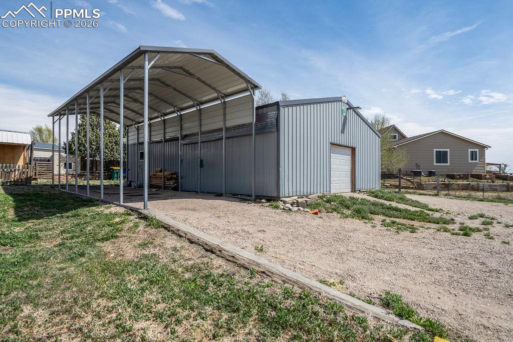 Image 37 of 46: RV parking and 30x40 Cleary pole barn. 