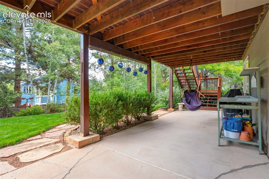 Image 4 of 50: Access the covered patio from the walk-out basement to enjoy the oaisis tha