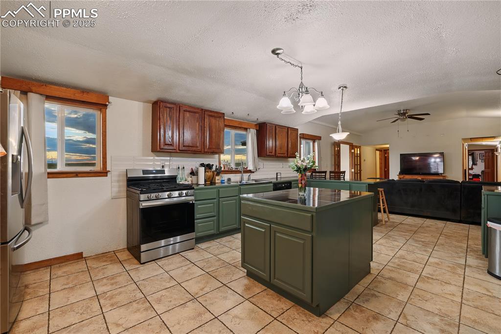 Image 13 of 50: Open kitchen space would be perfect for a breakfast nook