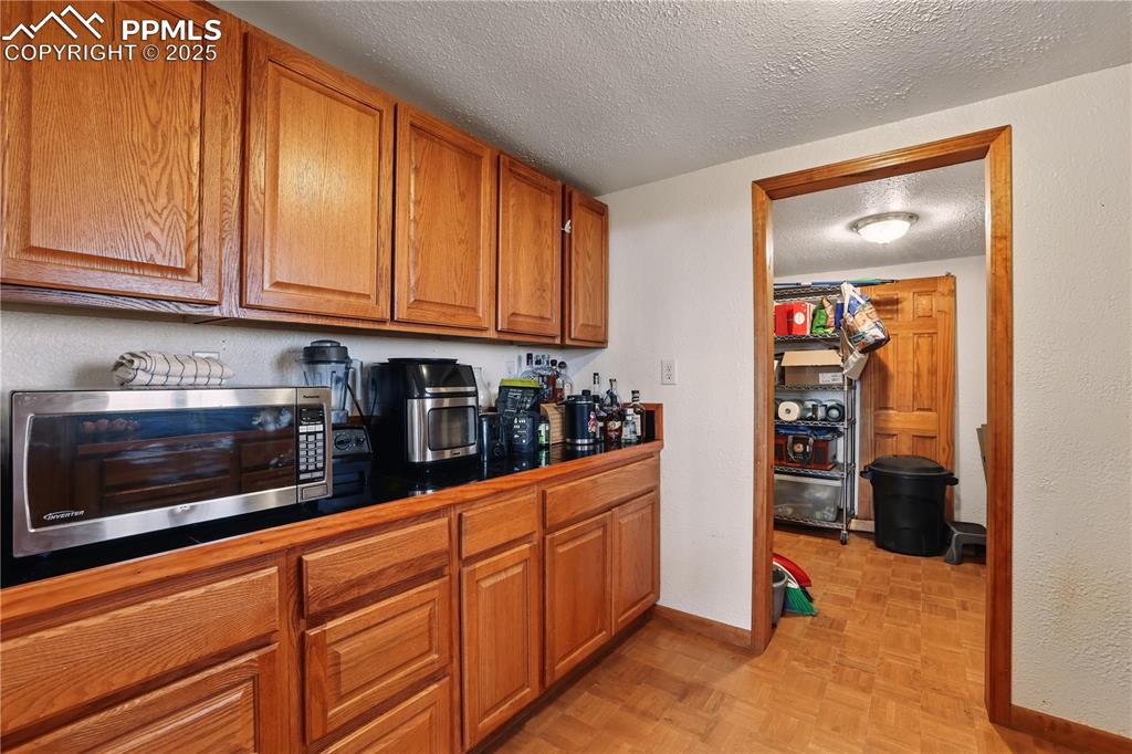 Image 16 of 50: Through the butlers pantry you
