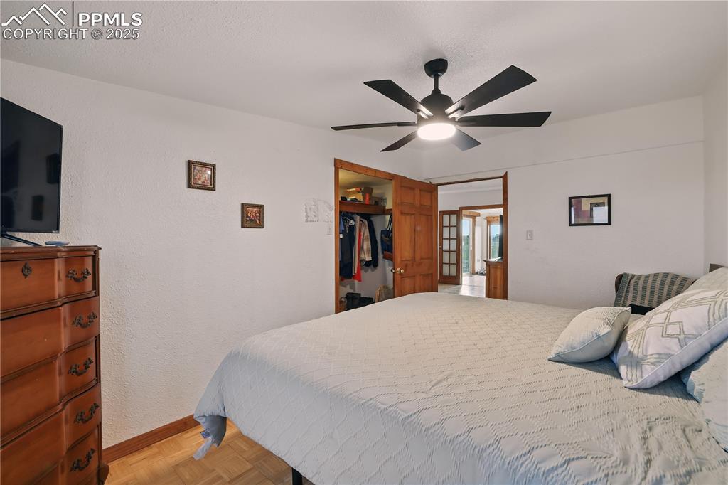 Image 29 of 50: Bedroom 2 also features a ceiling fan