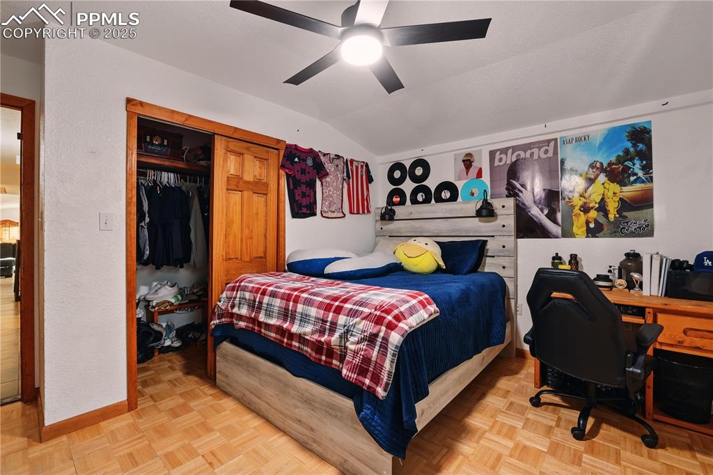 Image 31 of 50: Bedroom 3 is a large room with lots of natural light.