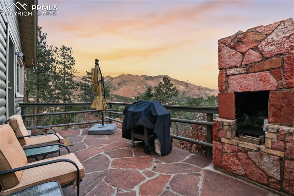 Image 28 of 47: Imagine watching the sun set from this patio. 